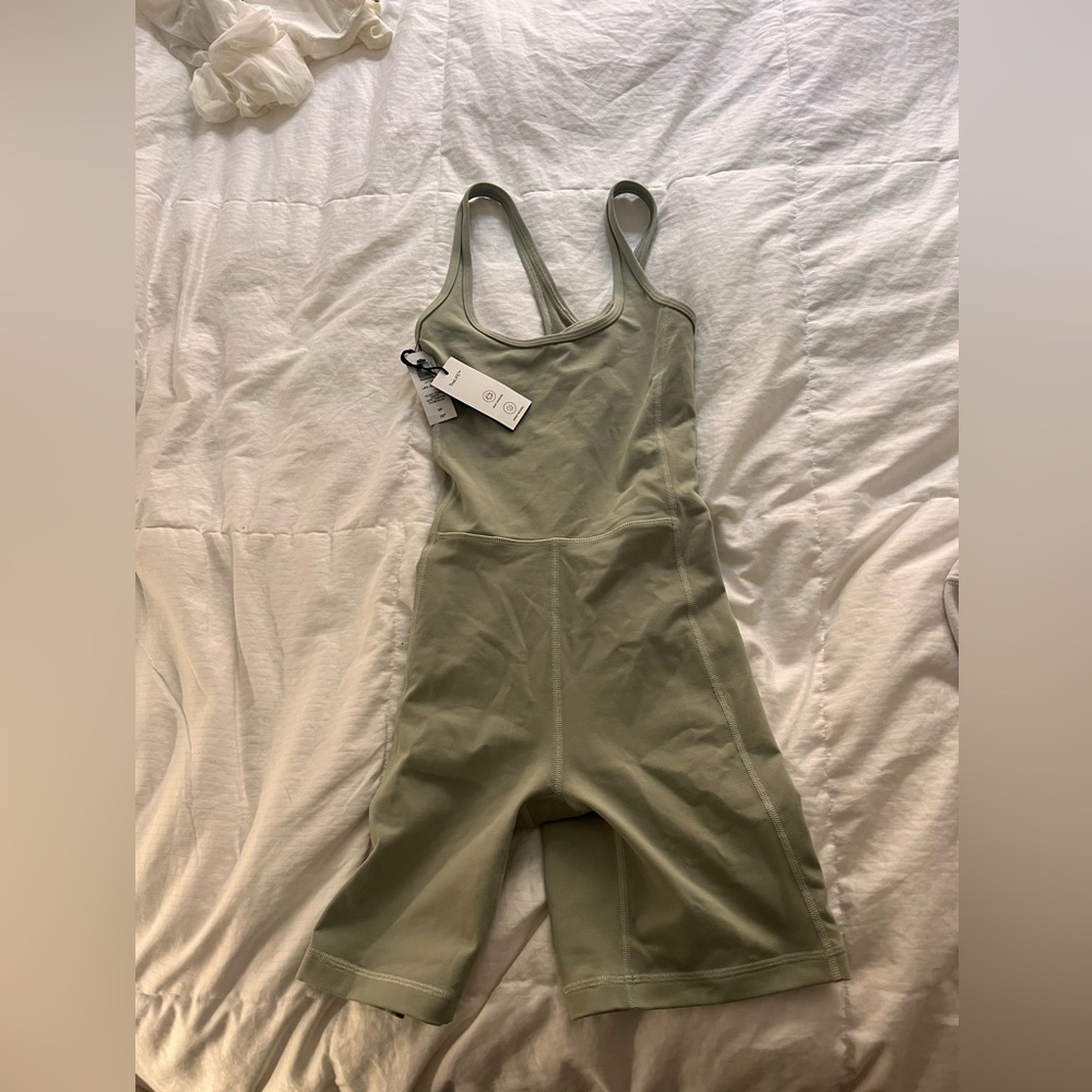 NWT Aritizia Shorts Romper with Criss Cross back size S